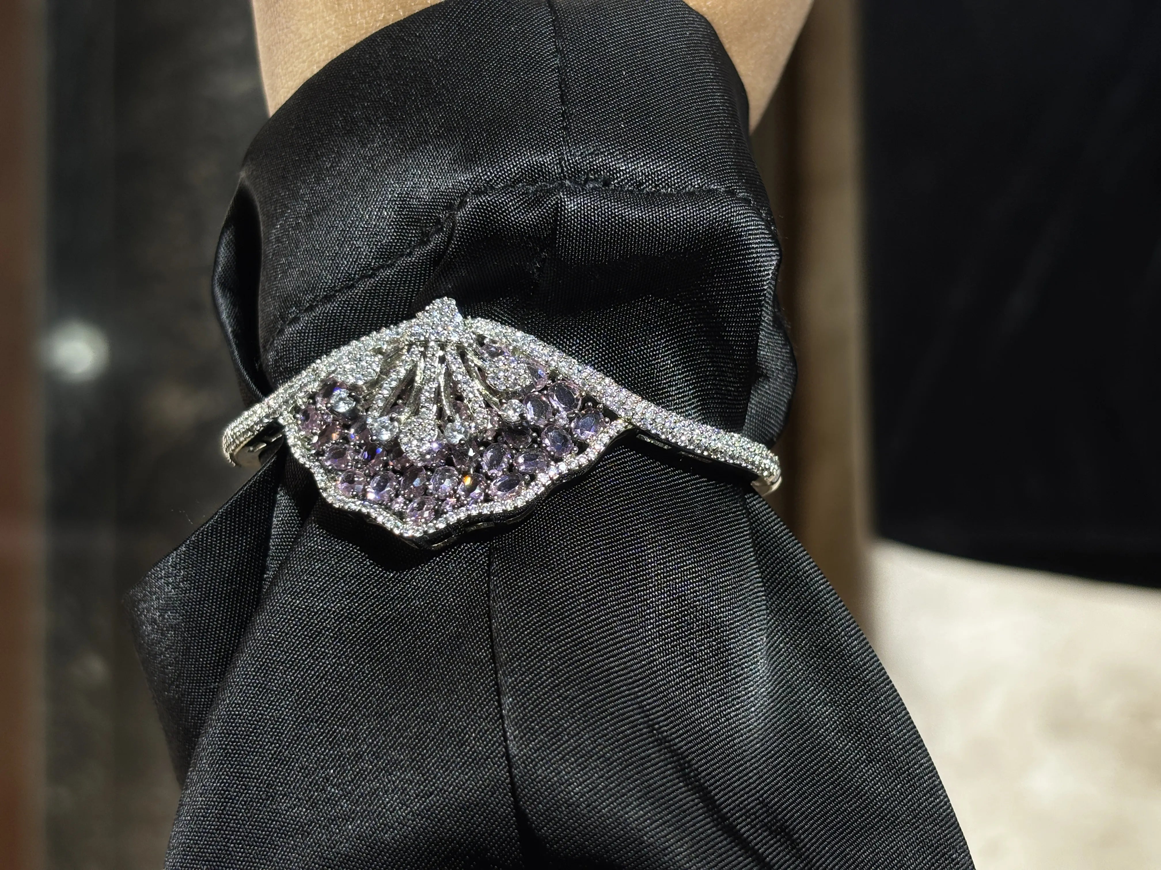 Elegant bracelet on a black fabric background