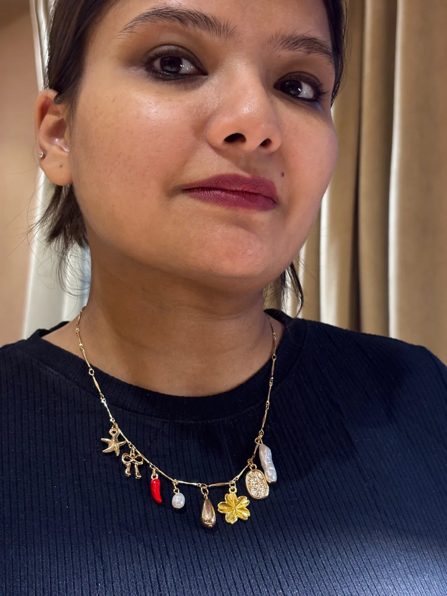 Charm Cascade Layered Necklace – Gold-Tone Multi Motif Statement